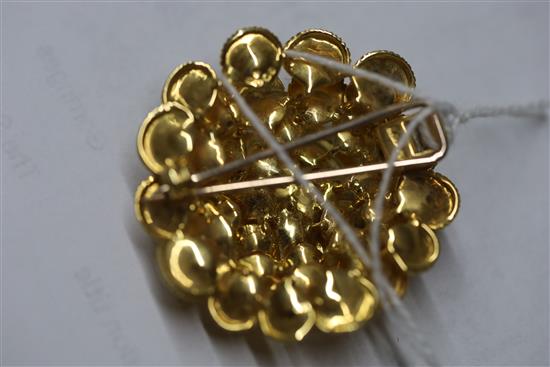 A 1960s Kutchinsky textured 18ct gold flower head clip brooch, 38mm.